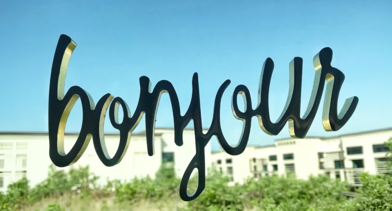bonjour sign to illustrate AI video localization in other languages
